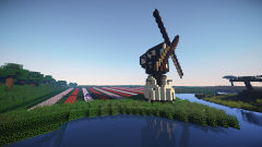 Windmill and tulip field